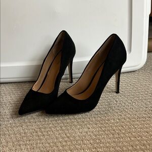 Black suede pumps
